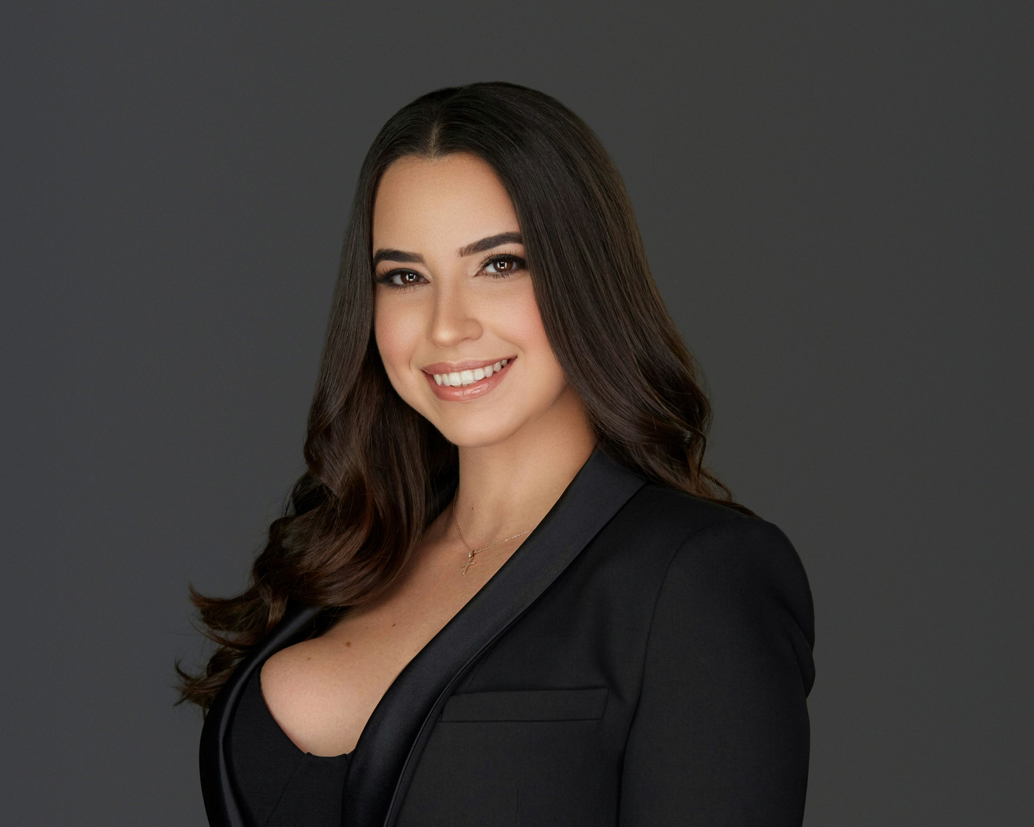 woman in black long sleeve shirt smiling